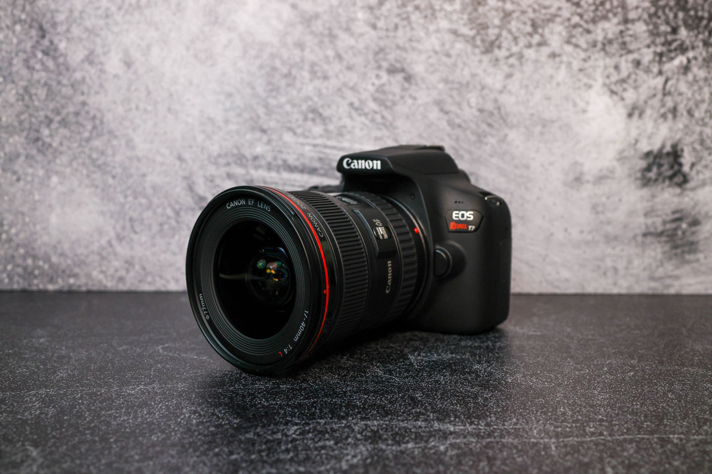 Canon 17-40mm f/4.0 Camera Lens attached to a Canon EOS Rebel T7 camera body