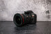 Canon 17-40mm f/4.0 Camera Lens attached to a Canon EOS Rebel T7 camera body