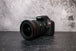 Canon 17-40mm f/4.0 Camera Lens attached to a Canon EOS Rebel T7 camera body